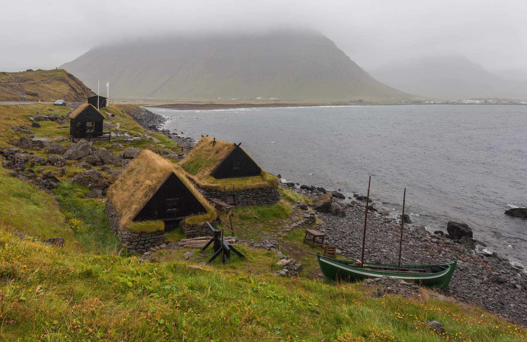 An example of a very small museum: A maritime museum located in the village of Bolungarvík, Vestfirðir, Iceland showing a 19th-century fishing base: typical boat of the period and associated industrial buildings.