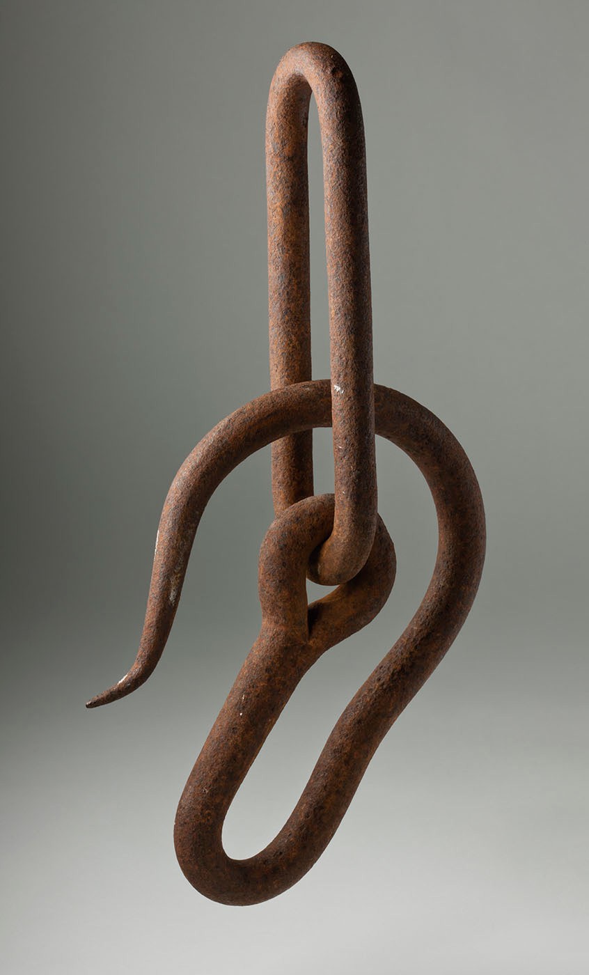 Safety hooks were important for safely hoisting buckets of dirt and rock to the surface from shafts where miners remained below. -  National Museum of Australia