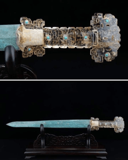 Chinese bronze sword with turquoise studded, gold inlaid rock crystal hilt.