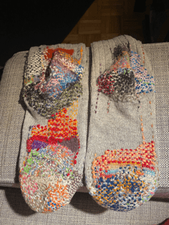 mended socks by Audrey D'Astous