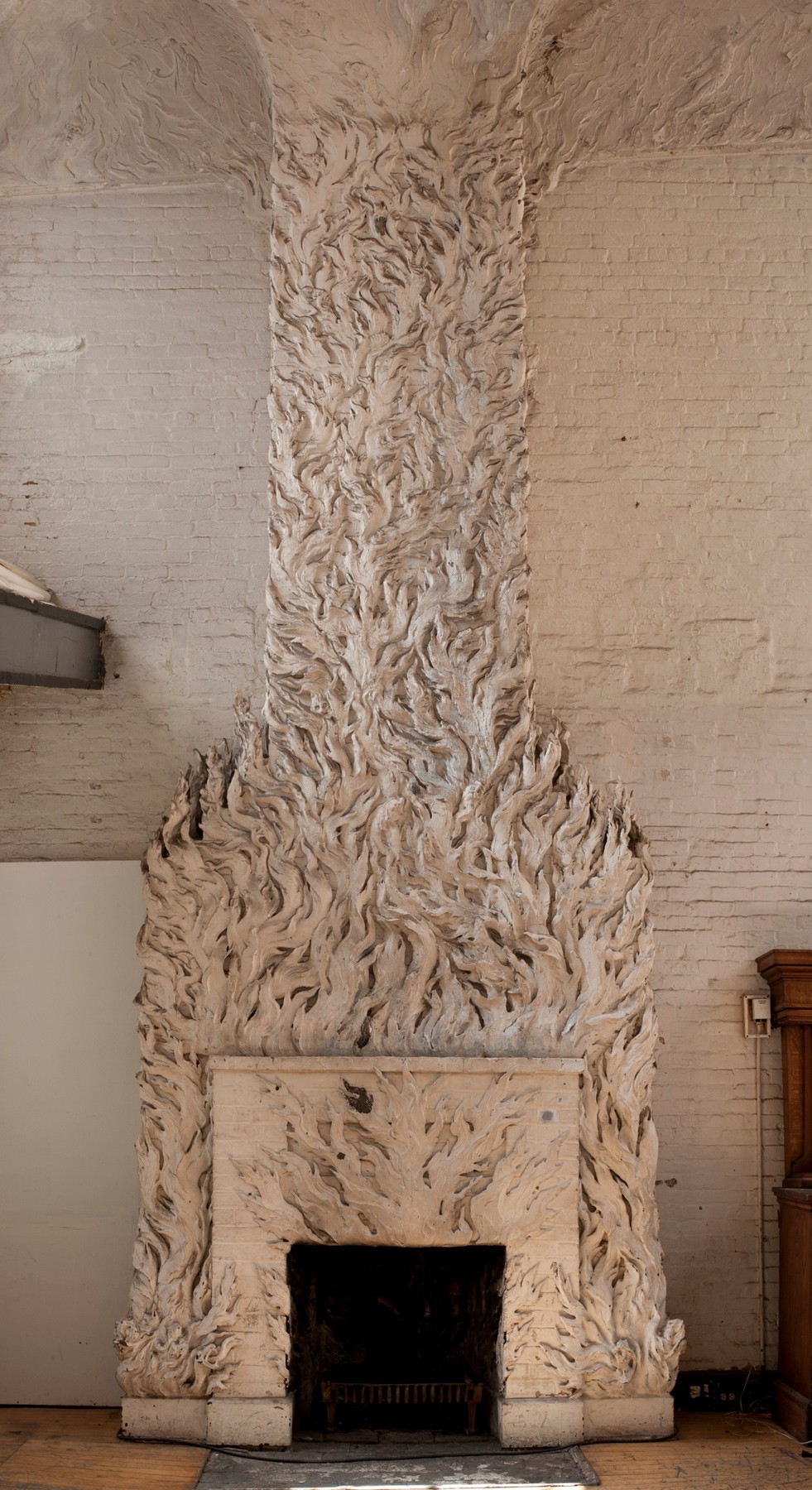 Fireplace by Robert Winthrop Chanler at Gertrude Vanderbilt Whitney's studio in New York City, 1918.