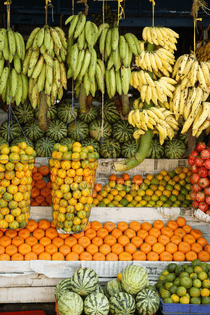 focused_176129272-stock-photo-fruit-shop-banana-orange-sweet.jpg