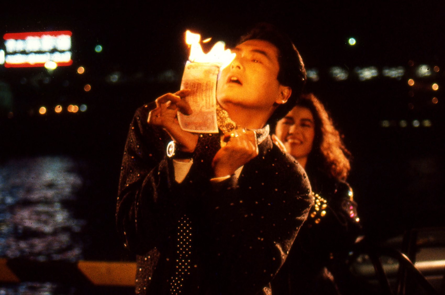 Hong Kong actor Chow Yun-fat on comedy film “The Eighth Happiness.” Tsim Sha Tsui, 1987. Photo: Greg Girard, courtesy of Blue Lotus Gallery.