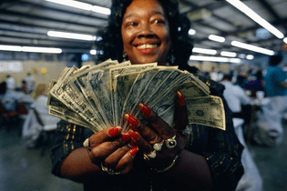 A Black Woman Flexing With The Money She Hit For At Bingo. (Red Rock, Oklahoma) (1994)