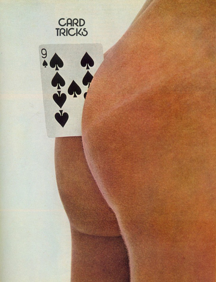 Human butt cheeks clasp a nine of spades under the title Card Tricks.
