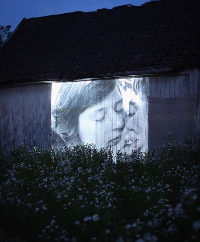 “Summer with Monika” dir. Ingmar Bergman (1953) screening on a side of a barn in Iowa, USA.