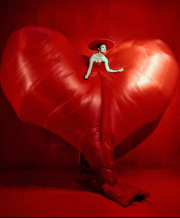 Kristian Schuller photographing a Peggy Schuller dress 