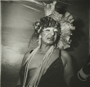 05-diane-arbus-transvestite-at-a-drag-ball-n.y.c.-1970-1970-scaled.jpeg