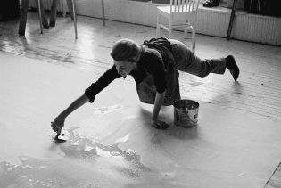Helen Frankenthaler at work in her studio, 1969; photographed by Ernest Haas