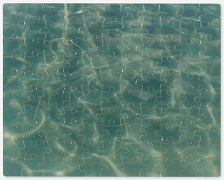 Felix Gonzalez-Torres
“Untitled” (Warm Water), 1988
c-print jigsaw puzzle in plastic bag 
7.5 x 9.5 inches (19.05 x 24.13 cm)