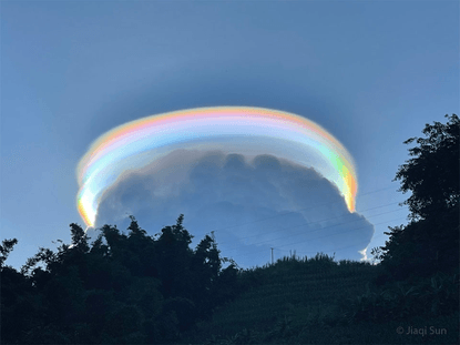 An Iridescent Pileus Cloud over China - Image Credit &amp; Copyright: Jiaqi Sun （孙嘉琪） 