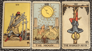 seven of swords + the moon + the hanged man