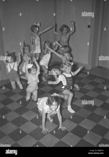 children-in-the-1930s-a-group-of-small-girls-at-a-dancing-school-playing-together-photo-kristoffersson-ref-13-5-sweden-1939-...