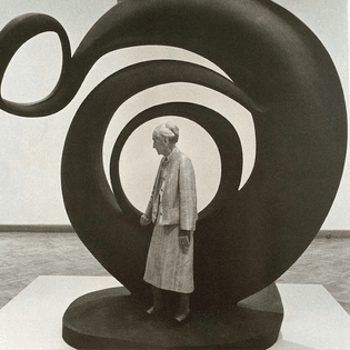 Georgia O’Keeffe with her sculpture
