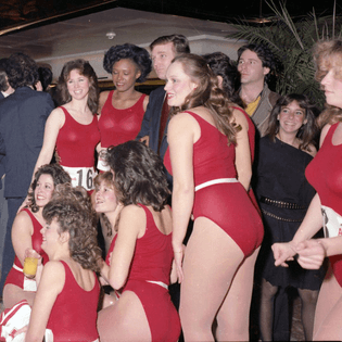 Donald Trump and cheerleader contestants for the New Jersey Generals, a football team he owned in 1984-1985.