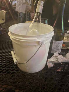 Keep ur wine in a little bucket with ice 