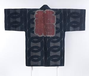 Sashiko stitching on a reversible fireman's coat with a design of ginkgo leaves (outer layer, shown top) and interlocking circles (inner layer, shown bottom), decorated with kanji characters applied using the tsutsugaki technique (plain-weave cotton, late Edo–early Meiji period, Los Angeles County Museum of Art)