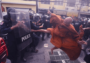 jpeg Thailand monk kicking police during a protest (2022)