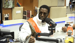 A image of Diddy being interviewed on The Breakfast Club
