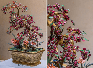 A plum blossom bonsai made by Zaoban in the middle of the Qing Dynasty (1636–1912 CE). The petals of the red plum are made of 284 rubies, the stamens are gold-plated copper, and the leaves are made of emerald. Now housed at the Palace Museum in Beijing, China