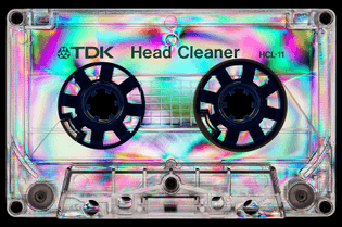 1600px-Photoelasticity_-_TDK_Head_Cleaner_-_Black_background.jpg