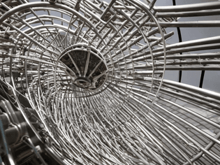a rollercoaster  metal space handheld artefact out of focus