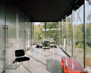 steel-framed-house-with-glass-walls-in-ripanj-by-ten-studio-4.jpg