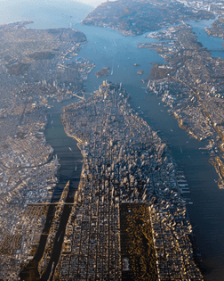 "This particular shot has never been taken before. Taken at almost 3 miles above NYC in a 🚁 with the doors open. The pilot had to be on Oxygen to legally and safely pilot the aircraft. This is the result of a highly planned and coordinated photo shoot."