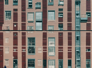 new york rainbows warehouses symmetrical architecture infrastructural bloom