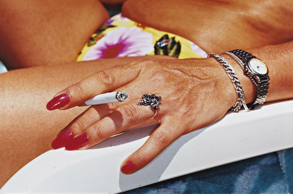martin-parr-common-sense-womans-hand-with-cigarette-benidorm-1997.jpg