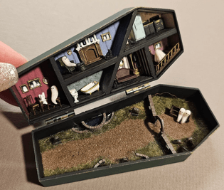 Tiny Ghosts Haunt Miniature Coffin Houses