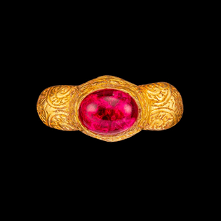 A gold and red-gem repoussé ring Champa, 14th century