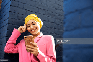 young-muslim-woman-using-phone.jpg?s=2048x2048-w=gi-k=20-c=brtjyxexlsj5muxro2erwrucb03b4onzekhgcnze6nc=