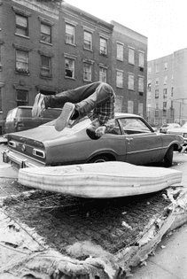 Boy Flipping on Trashed Mattress