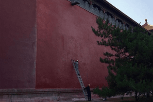 Painting the outer walls of the Forbidden City
