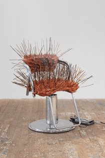 Sondra Perry, OPEN ROADS, April 20, 2023, Barbershop chair, plasticine, aluminum, incense, motor, 35 × 26 × 23 in.