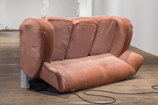 Sondra Perry, couch and fern, 2020, 2021, 2022, 2023, 1934, Sofa with video screen, fern, floral foam, sound, sofa: 86 × 80 × 180 in. 