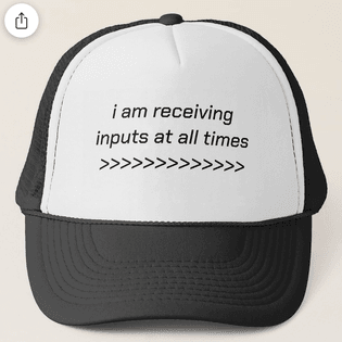 "i am receiving inputs at all times" trucker hat