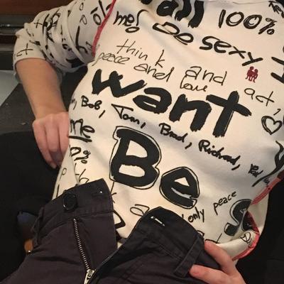 photo capturing the phrase, be sexy, think and act, peace and love