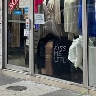 photo capturing the phrase, kiss me later