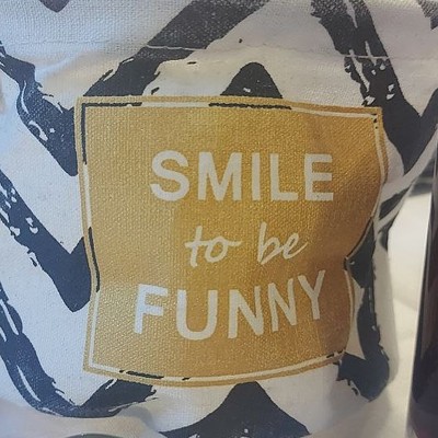 photo capturing the phrase, smile to be funny