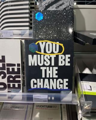 photo capturing the phrase, you must be the change