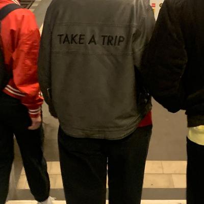 photo capturing the phrase, take a trip