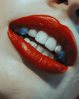 fernandaruiz__closeup_shot_of_woman_mouth_with_red_lips_and_blu_ab767ee0-86da-4889-8d9a-f7e81505d02f.png