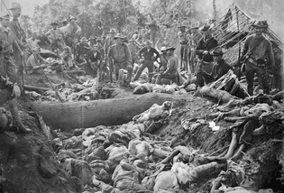 The bodies of Moro insurgents and civilians killed by US troops during the Battle of Bud Dajo in the Philippines, March 7, 1906.