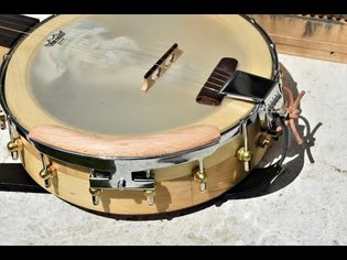 Pinewood experimental clawhammer banjo.