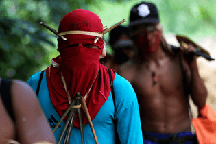 amazon-indians-strip-tie-beat-illegal-loggers.jpg