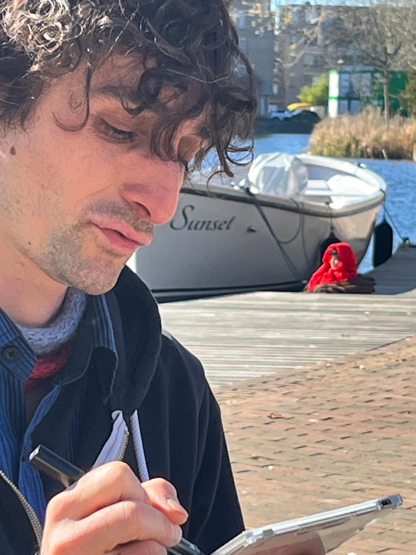 Elliott sketching, Emma resting by sunset