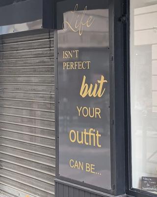 photo capturing the phrase, Life isn't perfect but your outfit can be..
